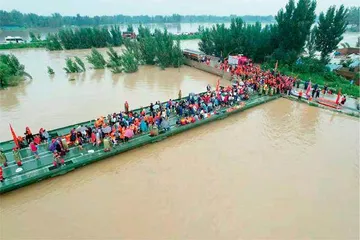 “豫”难而上  风雨同舟0